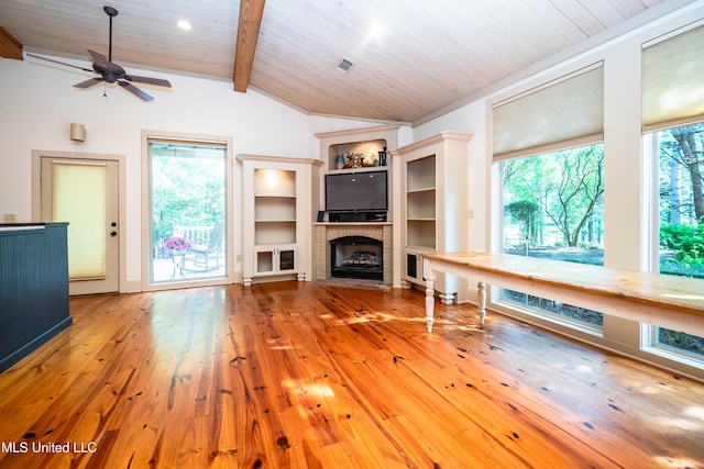 6147 Wirtz Rd, Flowood, MS 39232 - unfurnished living room featuring hardwood / wood-style floors, a ceiling fan, wood ceiling, a fireplace with flush hearth, and built in features