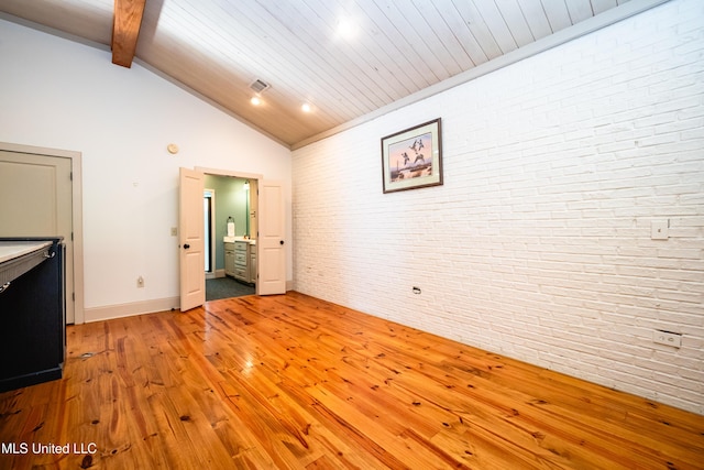 6147 Wirtz Rd, Flowood, MS 39232 - unfurnished living room featuring brick wall, light wood-type flooring, beamed ceiling, high vaulted ceiling, and recessed lighting