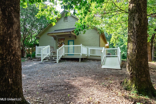 6147 Wirtz Rd, Flowood, MS 39232 - view of front of property featuring brick siding and a deck