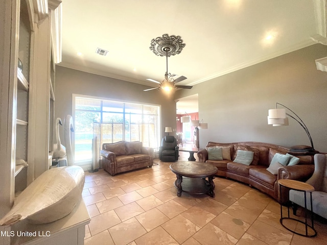 living room with crown molding and ceiling fan