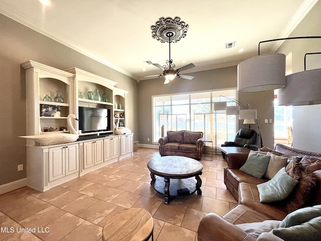 living room featuring ceiling fan and crown molding