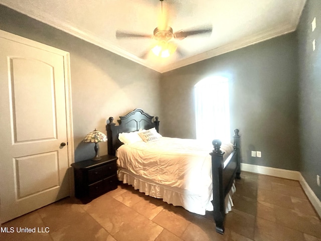 tiled bedroom with ceiling fan and ornamental molding