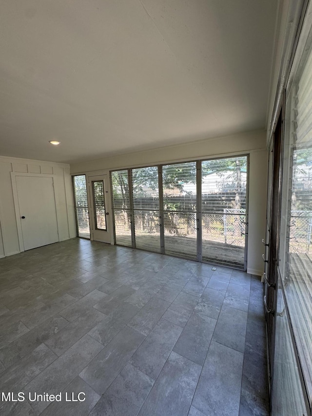 1597 Vicksburg Dr, Southaven, MS 38671 - spare room featuring dark stone finish floors