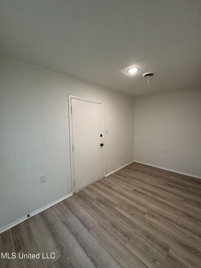 1597 Vicksburg Dr, Southaven, MS 38671 - empty room featuring wood finished floors and baseboards