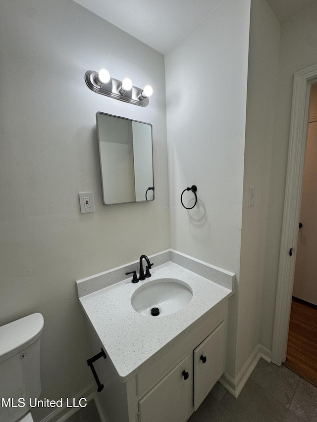 1597 Vicksburg Dr, Southaven, MS 38671 - half bathroom featuring toilet and vanity