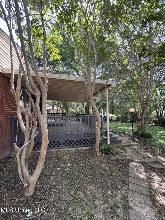 1597 Vicksburg Dr, Southaven, MS 38671 - view of yard featuring a deck