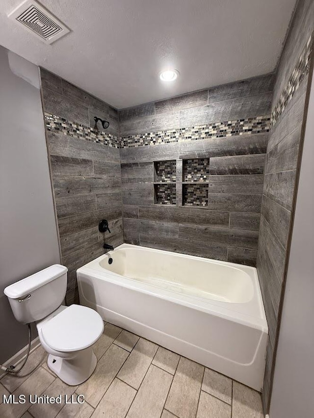22090 Rayvan Ln, Kiln, MS 39556 - bathroom featuring shower / bath combination, tile patterned flooring, and recessed lighting