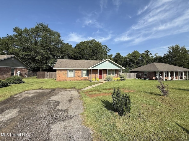 22090 Rayvan Ln, Kiln, MS 39556 - ranch-style house featuring brick siding