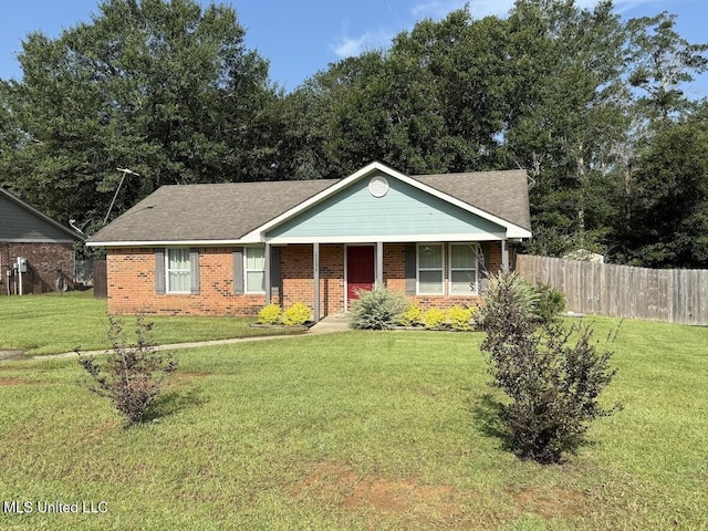 22090 Rayvan Ln, Kiln, MS 39556 - ranch-style house with brick siding, a porch, and a shingled roof
