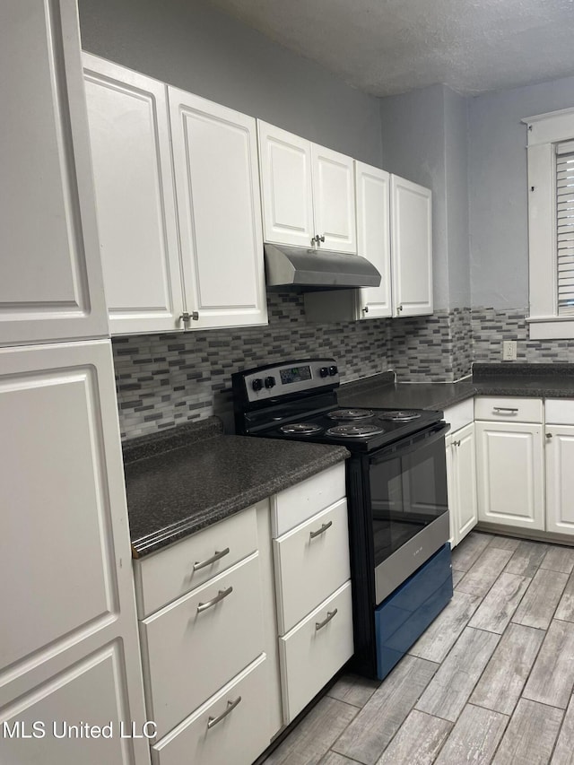 kitchen featuring tasteful backsplash, stainless steel range with electric cooktop, a textured ceiling, white cabinets, and light wood-type flooring