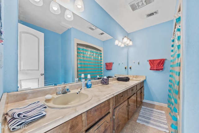 bathroom featuring vanity and tile patterned floors