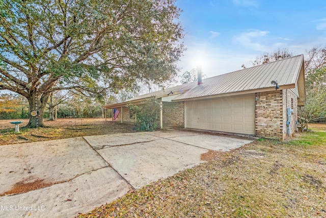 exterior space featuring a garage