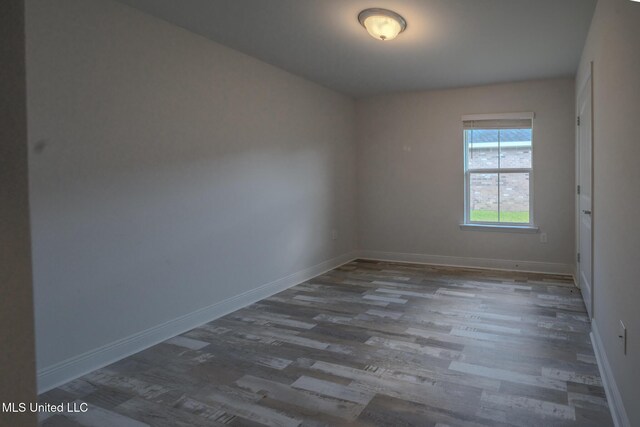 13724 Fox Hill Dr, Gulfport, MS 39503 - empty room featuring wood finished floors and baseboards