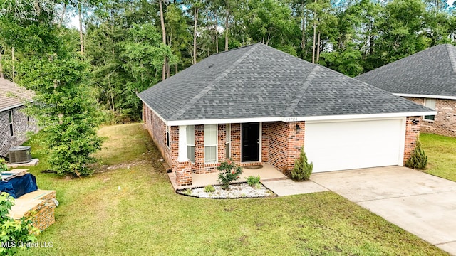 13724 Fox Hill Dr, Gulfport, MS 39503 - view of front facade with roof with shingles, brick siding, an attached garage, and central AC