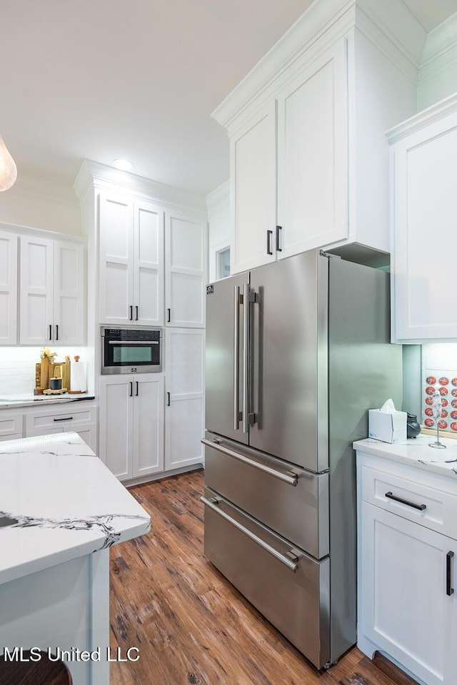 29 Club Dr, Natchez, MS 39120 - kitchen with white cabinets, crown molding, and high end refrigerator