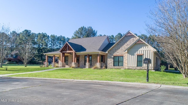 29 Club Dr, Natchez, MS 39120 - craftsman inspired home featuring stone siding, board and batten siding, and a front yard
