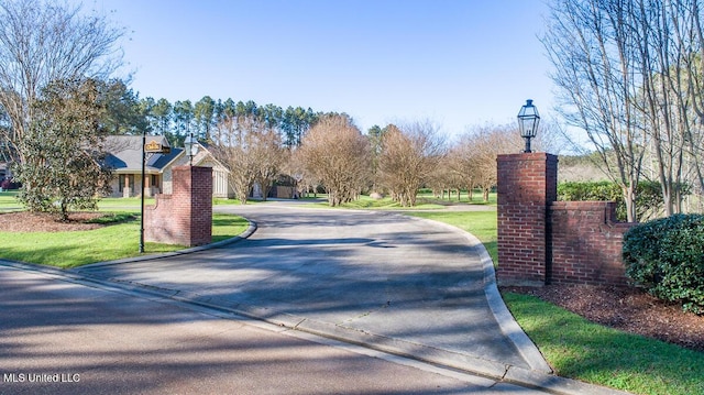 29 Club Dr, Natchez, MS 39120 - view of road with street lighting and curbs