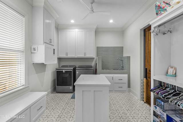 laundry room with baseboards, ceiling fan, recessed lighting, cabinet space, and independent washer and dryer