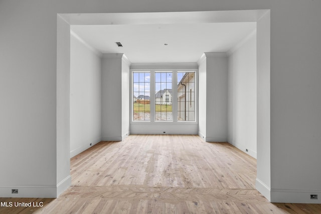 230 Parke Dr, Ridgeland, MS 39157 - spare room featuring baseboards, ornamental molding, and wood finished floors