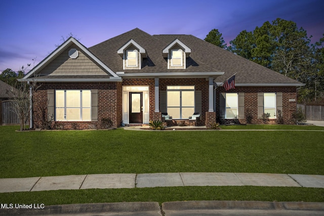 view of front of home featuring a yard