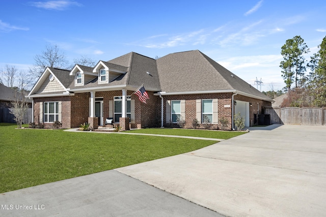 craftsman inspired home with a garage and a front yard