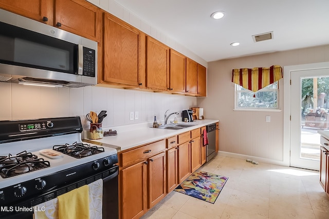 kitchen featuring appliances with stainless steel finishes and sink