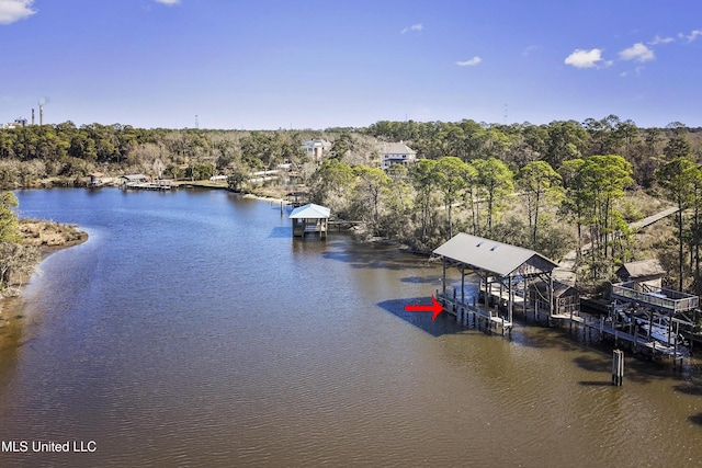 exterior space with a water view