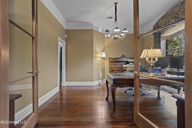 home office with visible vents, crown molding, baseboards, a chandelier, and wood finished floors