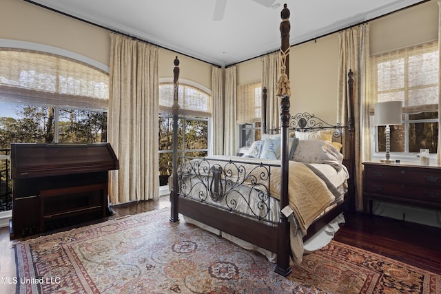 bedroom featuring ceiling fan and wood finished floors
