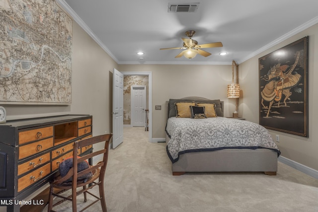 bedroom with visible vents, light carpet, baseboards, and ornamental molding