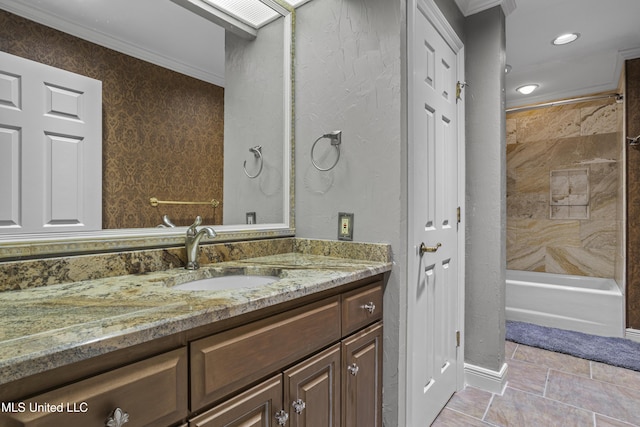 bathroom with vanity, crown molding, tile patterned floors, and shower / washtub combination