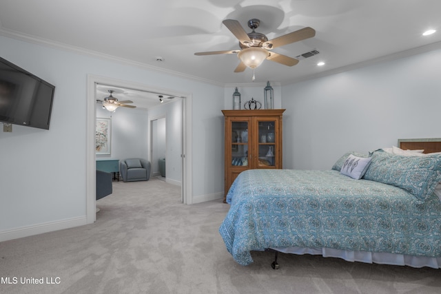 carpeted bedroom with visible vents, recessed lighting, crown molding, and baseboards