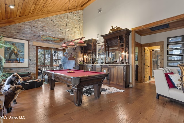 recreation room featuring visible vents, billiards, hardwood / wood-style floors, wooden ceiling, and indoor wet bar