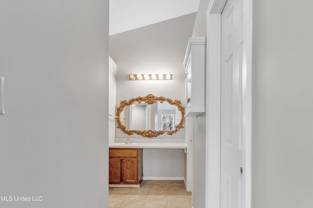 bathroom featuring vanity and tile patterned flooring