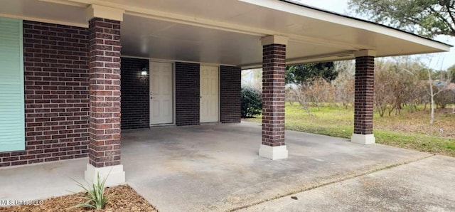 view of patio / terrace featuring a carport