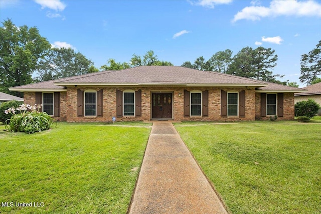 5967 Huntview Dr, Jackson, MS 39206 - ranch-style house featuring a front lawn, a shingled roof, and brick siding