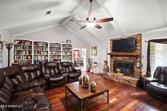 5967 Huntview Dr, Jackson, MS 39206 - living area featuring wood-type flooring, a brick fireplace, and ceiling fan
