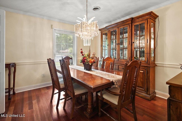 5967 Huntview Dr, Jackson, MS 39206 - dining space with a chandelier, ornamental molding, baseboards, and dark wood-style flooring