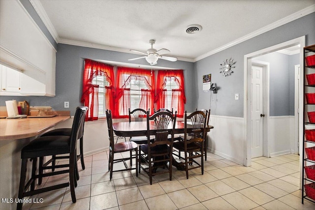 5967 Huntview Dr, Jackson, MS 39206 - dining space featuring ornamental molding, light tile patterned flooring, and ceiling fan