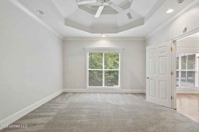 144 Whisper Lake Blvd, Madison, MS 39110 - empty room featuring carpet floors, ornamental molding, a ceiling fan, a tray ceiling, and recessed lighting