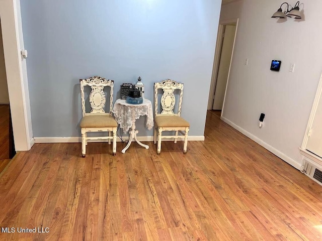 1818 Vaught Cir, Southaven, MS 38671 - sitting room featuring baseboards, visible vents, and wood finished floors