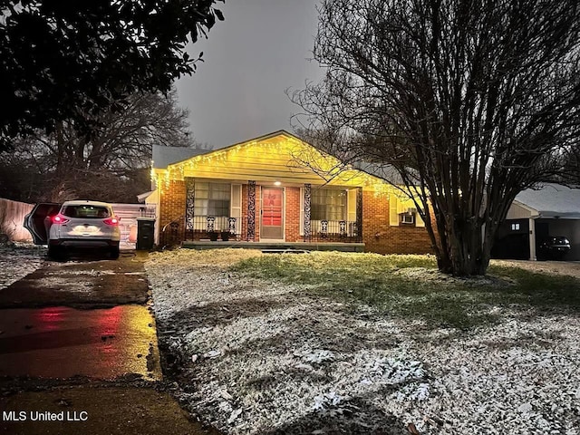 1818 Vaught Cir, Southaven, MS 38671 - view of front facade with brick siding and a porch