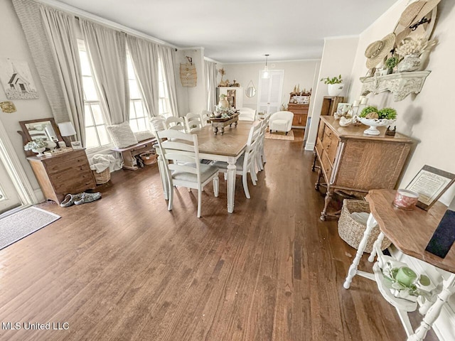 1802 Robinson St, Natchez, MS 39120 - dining room featuring crown molding and wood finished floors