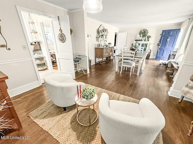 1802 Robinson St, Natchez, MS 39120 - living room featuring wood finished floors, crown molding, and baseboards