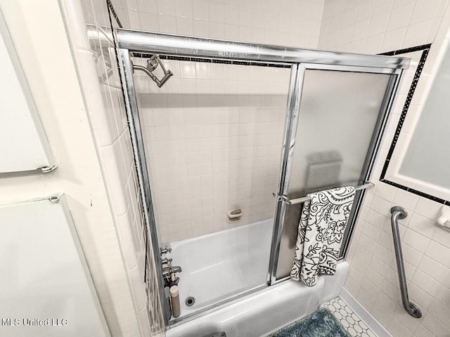 1802 Robinson St, Natchez, MS 39120 - full bath featuring shower / bath combination with glass door and tile walls