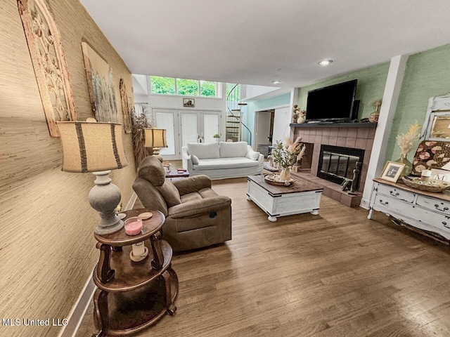 1802 Robinson St, Natchez, MS 39120 - living area with recessed lighting, wood finished floors, and a tiled fireplace