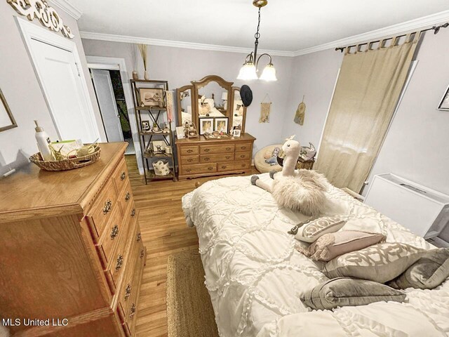 1802 Robinson St, Natchez, MS 39120 - bedroom featuring light wood-style floors and crown molding
