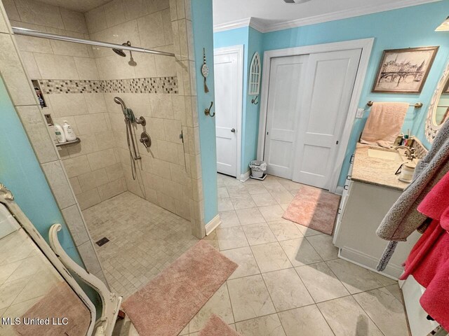 1802 Robinson St, Natchez, MS 39120 - full bathroom with baseboards, vanity, a stall shower, and ornamental molding