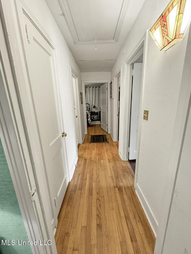 1802 Robinson St, Natchez, MS 39120 - hall featuring attic access, baseboards, and light wood-style flooring