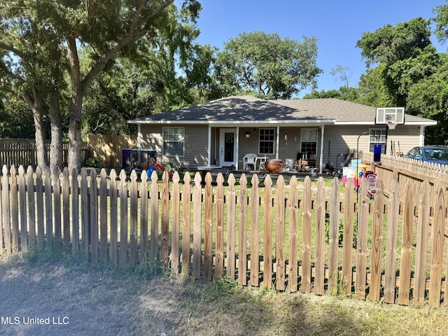 900 Orange St, Ocean Springs, MS 39564 - view of front of house featuring a fenced front yard and covered porch